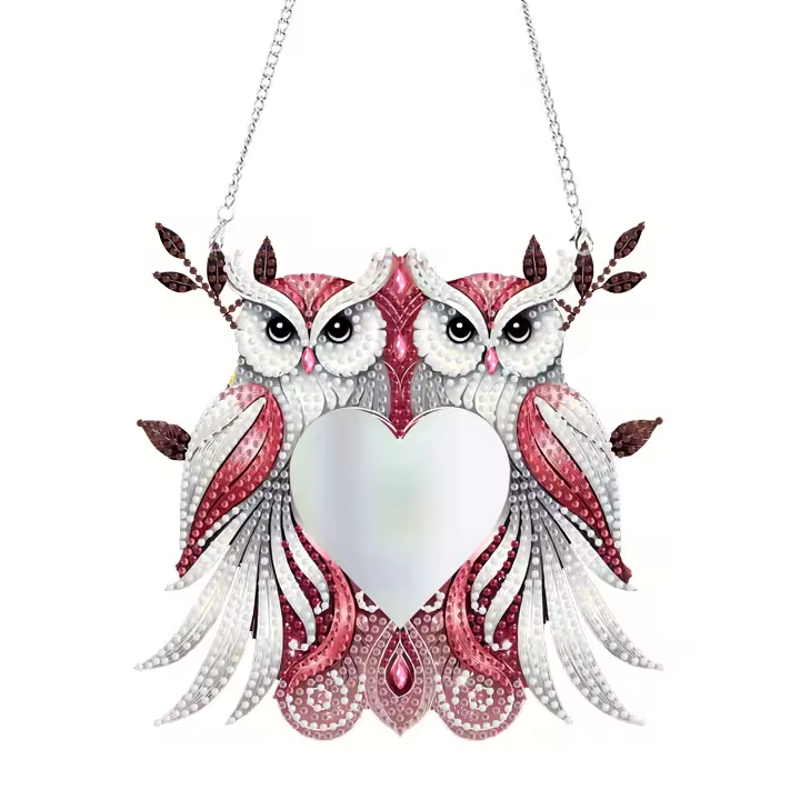 Hangende spiegel met twee uilen