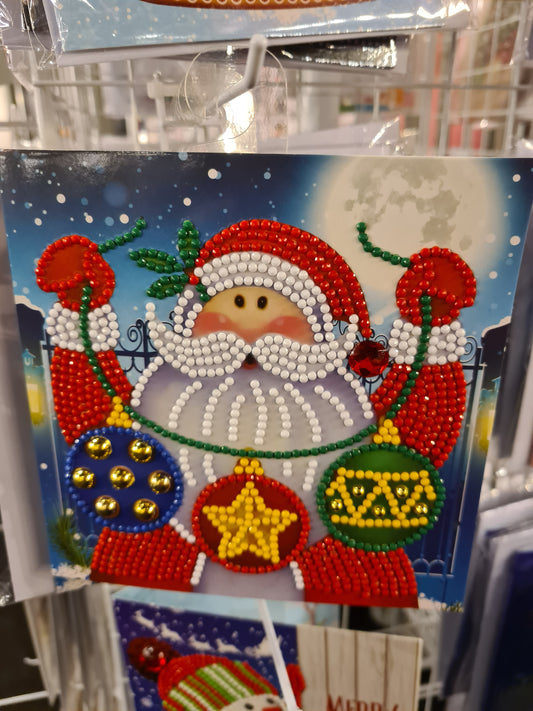 Weihnachtskarte Weihnachtsmann mit Kugelgirlande