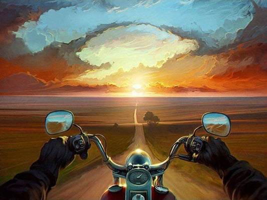 Motorcyclist sunset
